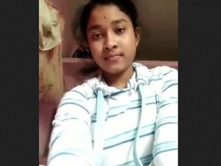 A saucy Indian gal flaunts her body in a