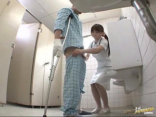 Asian nurse uses her strength to give a