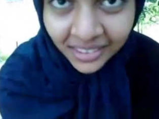 A cute lady from the web cam displays