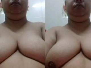 Bhabhi flaunts her humungous udders in a