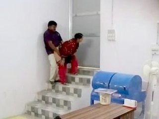 Caught in the act: Office duo gets