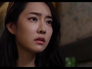 A Korean duo shares a sultry  in this