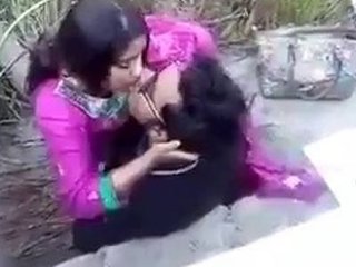 Passionate duo shares a smooch under the
