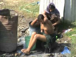 Exotic nymphs take an outdoor shower in