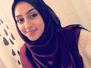 Pakistani female in hijab exposes her